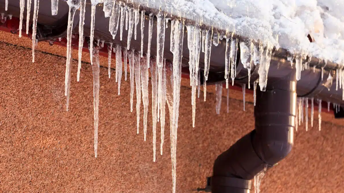 Ice Dams vs. Icicles What Your Gutters Are Telling You Learn the difference between ice dams and icicles and what they reveal about your gutters. Icicles hanging from a snowy rooftop gutter can signal heat loss or poor drainage, while ice dams may lead to leaks, roof damage, and costly repairs if ignored.